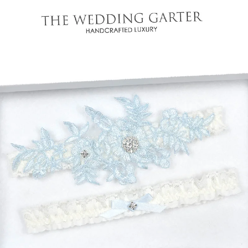back - fastening women gartersIvory Floral Lace With Blue Applique Bridal Garter Set