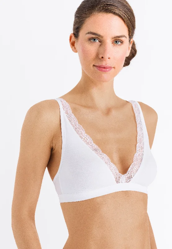 Bra with a foam - lined cup for a more structured shape​ Hanro Cotton Lace Soft Cup Wireless Bra in White
