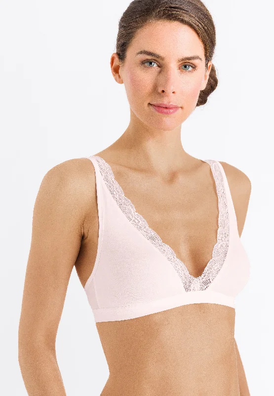 Underwire bras for enhanced support and shaping​ Hanro Cotton Lace Soft Cup Wireless Bra in Powder