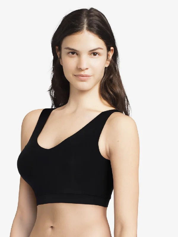 Bra with a matte finish for a more subdued appearance​ Chantelle Soft Stretch Padded V-Neck Crop Top Wireless Lounge Bra in Black